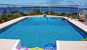 In-Ground Pool overlooking the water